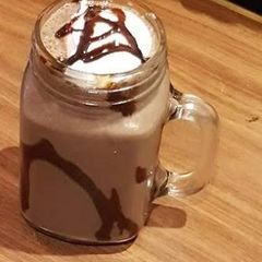 A picture of Cold coco with ice cream.