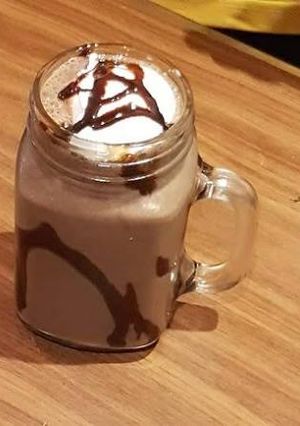 A picture of Cold coco with ice cream.
