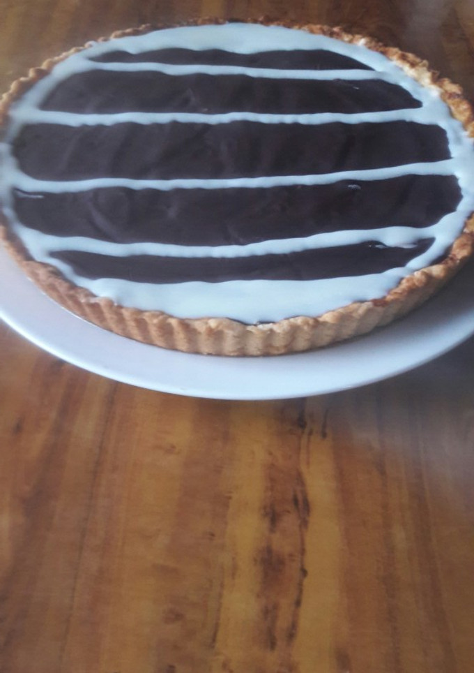 Una foto de Tarta de Ricota con cobertura de chocolate🍫