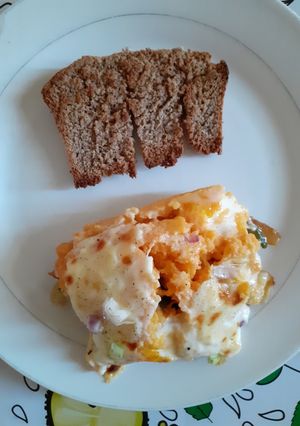 Una foto de Soufflé de calabaza con colchón de verduras