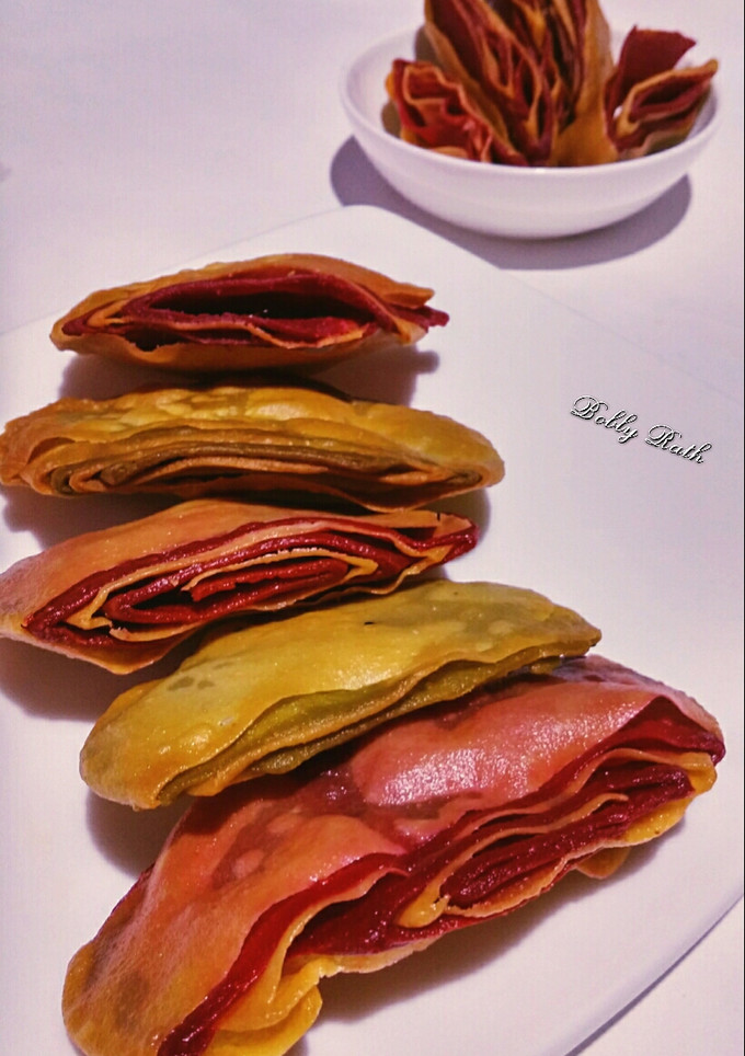 A picture of Multi layered beet spinach crackers.