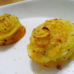 A picture of Garlic parmesan baked potato stacks.