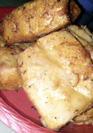 A picture of Bread coated with akara paste.
