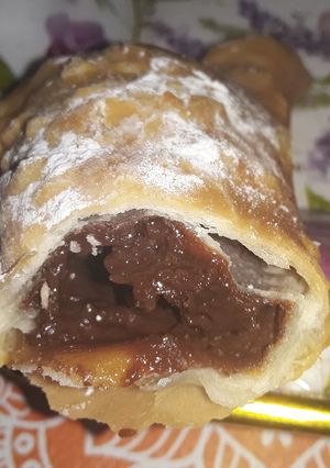 Una foto de Empanadas de dulce de Leche con Chocolate 😍