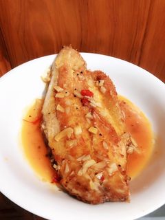 Hình của món Cá chẽm sốt chanh dây.