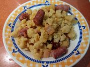 Una foto de migas con longaniza