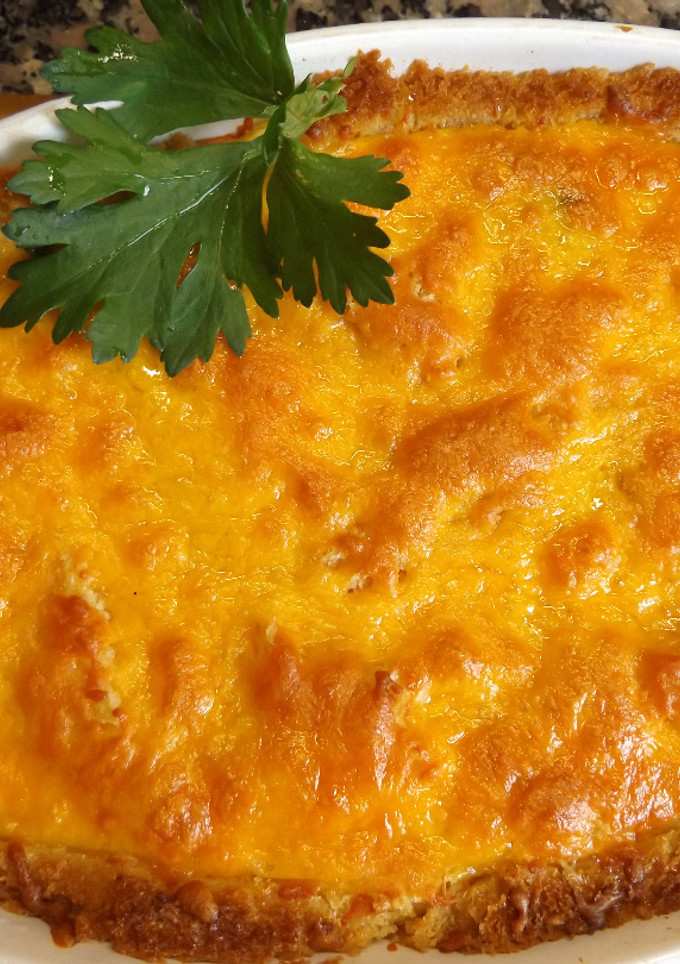 Una foto de Gratinado de acelgas, jamón y queso cheddar