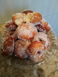 Una foto de Donut de queso con coco