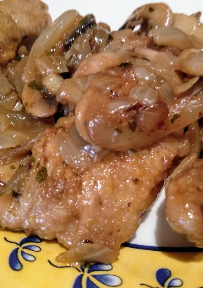 Una foto de Solomillo de cerdo con salsa de champiñones