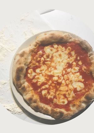 Foto di Pizza a canotto. Cottura con il metodo padella e grill