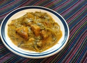 Una foto de Carne de puerco 🐷 con verdolagas 🌱 en salsa mixta 🍈🍅