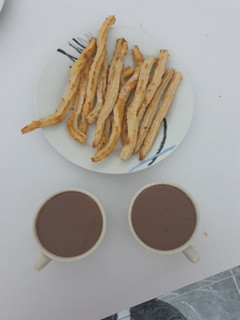 Una foto de Churros con chocolate saludables