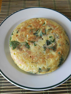 Una foto de Tortilla de patata y espinacas