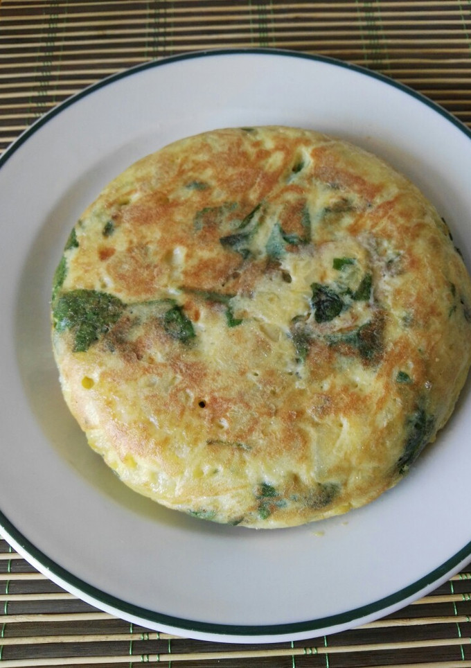 Una foto de Tortilla de patata y espinacas