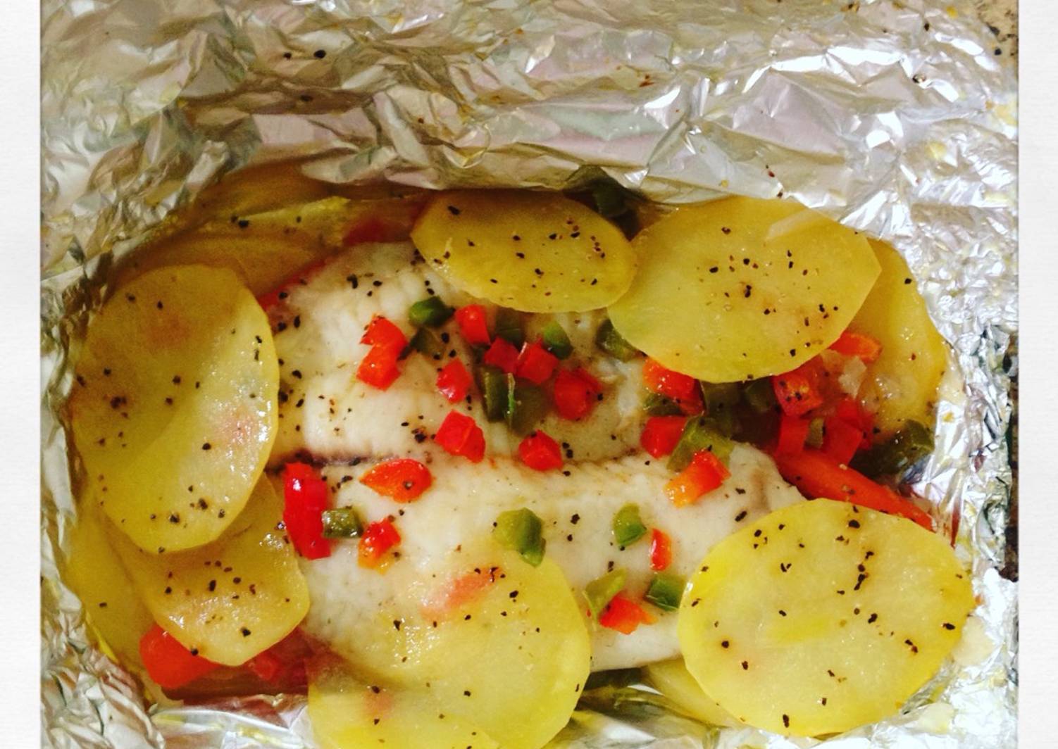 Tilapia al horno con vegetales Receta de Cocinando con Ivonne Cookpad