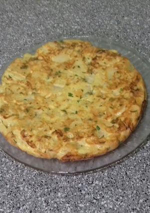 Una foto de Tortilla de papa y Perejil