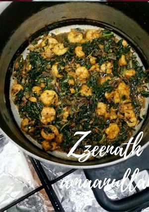 A picture of Harey Bharey Jhinge or Prawns with Amaranthus Leaves.