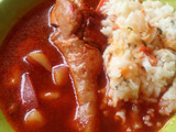 Pollo en caldo rojo