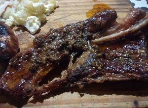 Una foto de Asado a la parrilla de corte americano al chimichurri