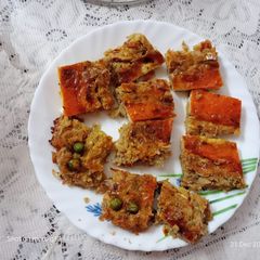 A picture of Baked leftover potato mix veg with egg.