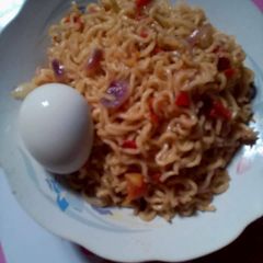 A picture of Indomine with boiled egg.