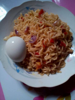 A picture of Indomine with boiled egg.
