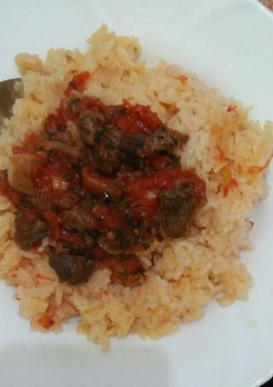 A picture of Wet fried beef with rice.