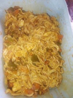 A picture of Chicken stir fry and noodles.