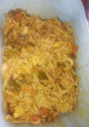 A picture of Chicken stir fry and noodles.