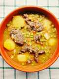 Spezzatino di vitello con patate e piselli