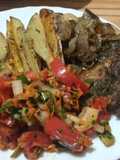 Carne al horno con papas y batatas con salsa schug