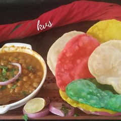 A picture of Poori Basket with chhole.