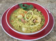 Una foto de risotto con calamar