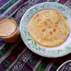 A picture of MALAI PARATHA & TEA.