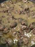 Riñones de cordero encebollados al vino blanco y coñac