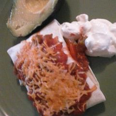A picture of Chicken enchiladas.