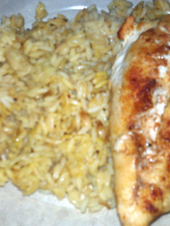 A picture of chicken and rice.
