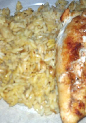 A picture of chicken and rice.