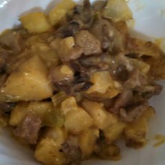 A picture of Beef tips and potato casserole.