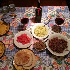 A picture of Mediterranean Pita Dinner, homemade: hummus, ground lamb and olive pate..