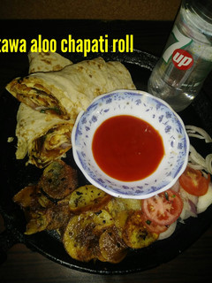 A picture of Tawa aloo chapati roll.