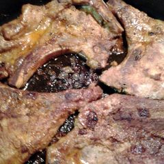 A picture of paprika pork steak in wine.