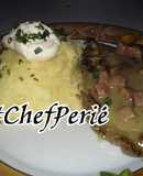 Chuletas de cerdo en crema de hongos y chorizo con puré de papas