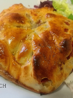 Una foto de Merluza Wellington con gambones