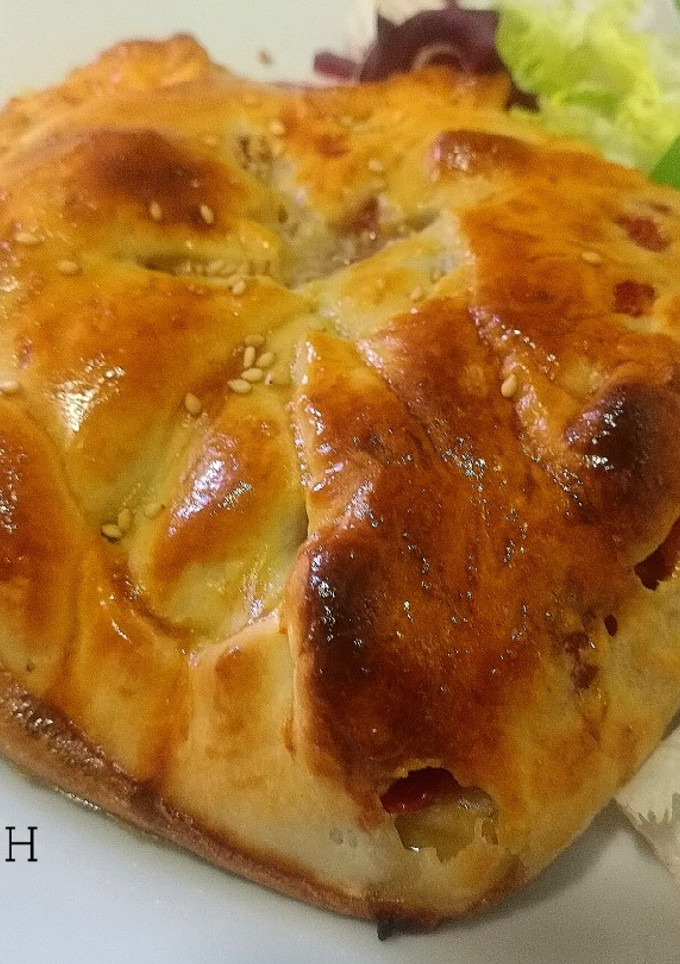 Una foto de Merluza Wellington con gambones