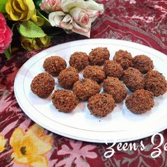 A picture of Ghee Residue and Jaggery Laddoos.