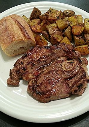 A picture of Grilled Lamb Steak with Italian Roasted Potatoes.