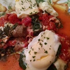 A picture of Spinach and Tomato Poached Eggs.