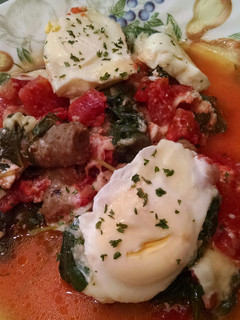 A picture of Spinach and Tomato Poached Eggs.