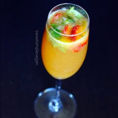A picture of Raw Vegan Strawberry Orange & Basil Mimosas.